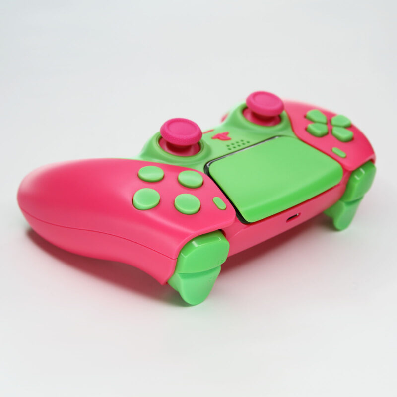 Back right angle of Guavatron Pink and Green PS5 Controller by Killscreen