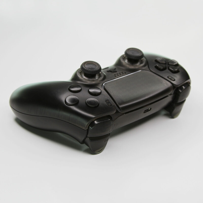 Back right angle of Clear Black PS5 Controller