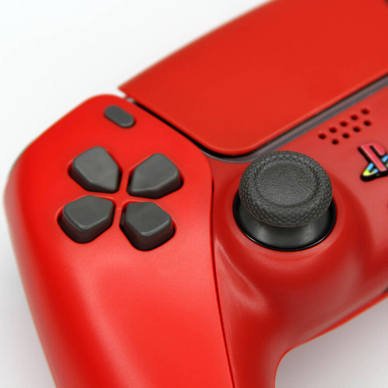 Close up of DS4 style dpad on Killscreen Cinnabar Red Retro PS5 Controller