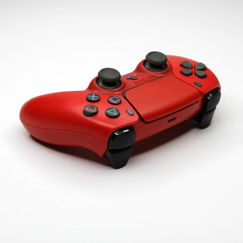 Action buttons on Cinnabar Red PS5 DualSense Controller