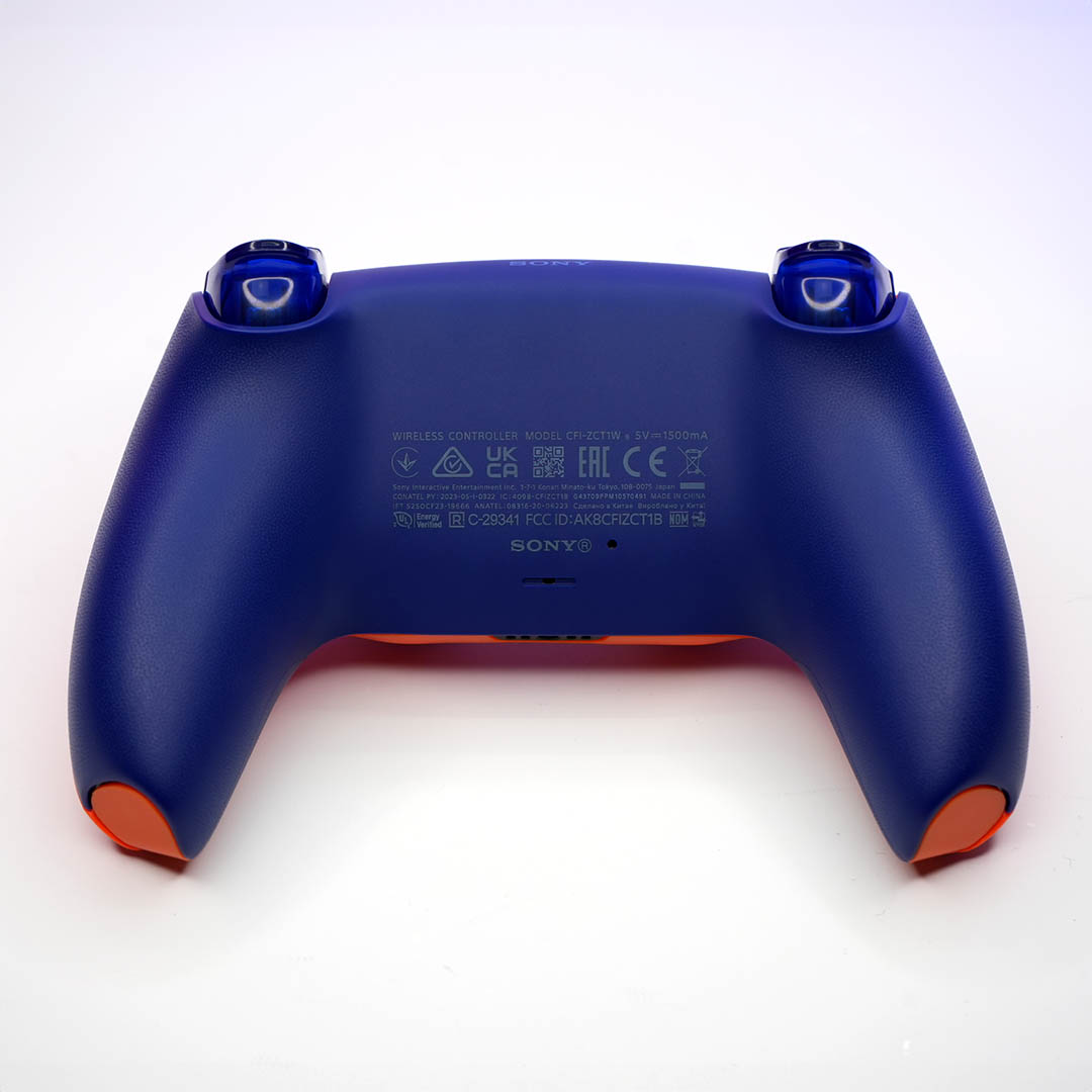 Back of Sunset Orange PS5 Controller by Killscreen