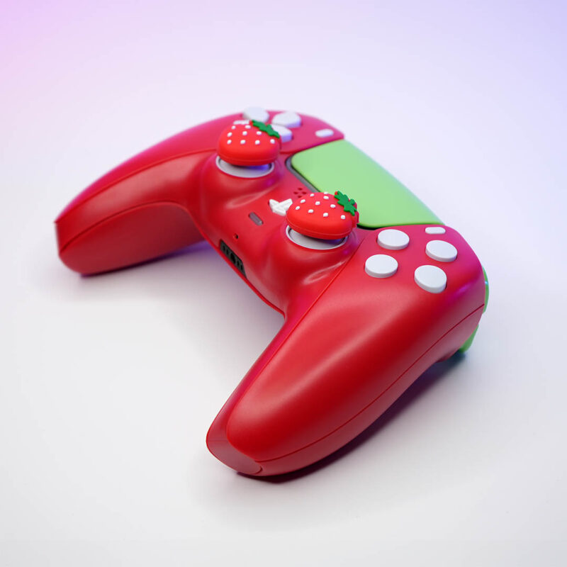 Angle view of Strawberry Red PS5 Controller by Killscreen