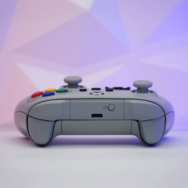 Rear view of the SNES-inspired Xbox Series X|S controller, featuring a matte gray shell and modern grip textures.